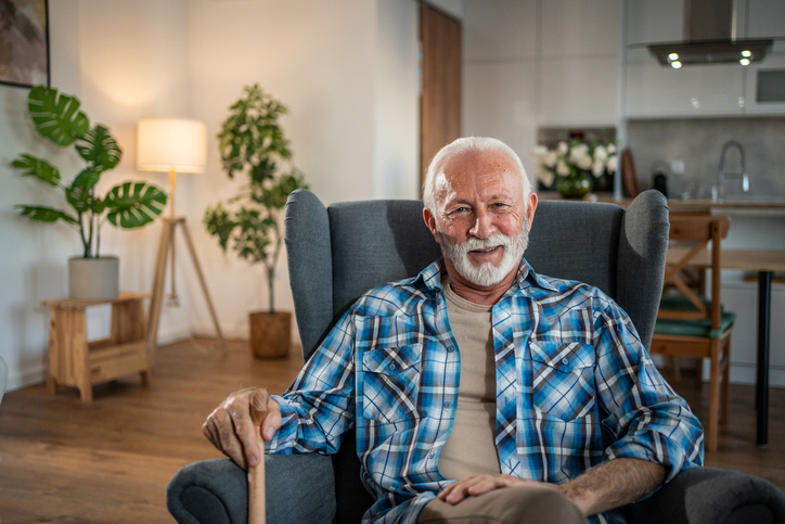 Portrait of a senior man relaxing in a comfortable armchair